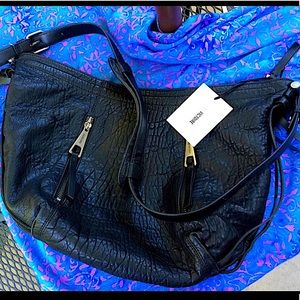 La Victorie bag. New with tag, but never used. New condition. Beautiful!!
